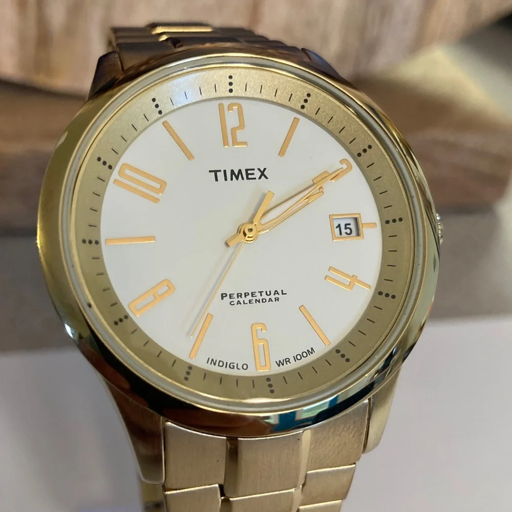 Timex gold tone Perpetual Calendar watch, stretch bracelet, new battery, indiglo